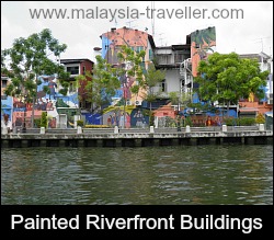 Painted murals along the river bank.