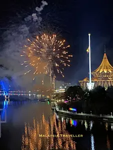 fireworks reflected on the Sarawak River in Kuching