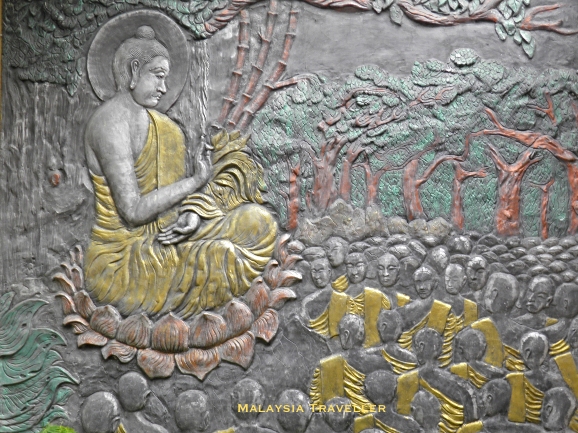 metal artowrk showing Buddha with disciples metal artowrk showing Buddha with disciples