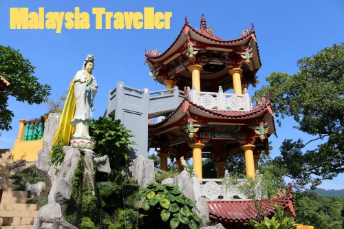 Pagoda, Guan Yin statue and koi fish pond. Pagoda, Guan Yin statue and koi fish pond.