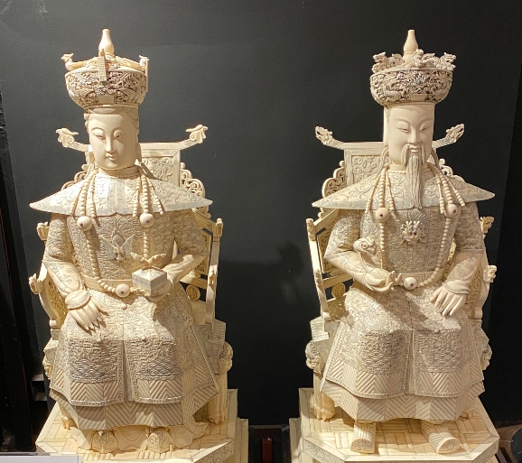 a pair of ivory statues of Qing emperor and empress a pair of ivory statues of Qing emperor and empress