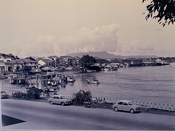 vehicles in Kuching were mostly British in those days like these three taxis