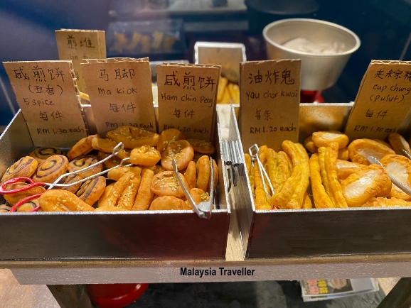 model of food stall selling Malaysian snacks
