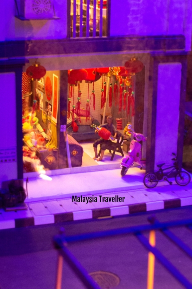 MinNature Malaysia model of person with Chinese New Year decorations