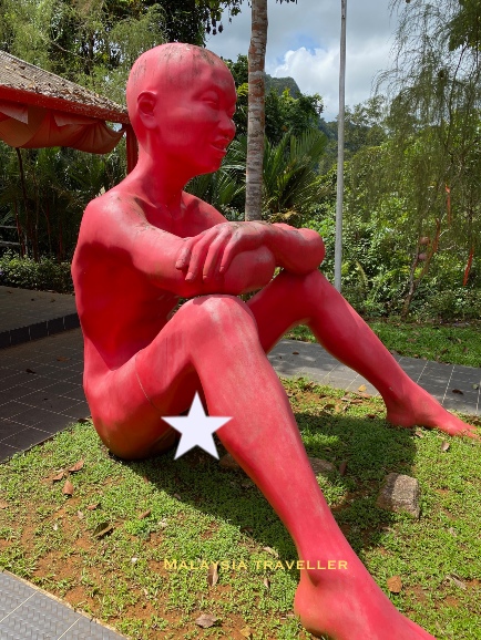 naked red man statue naked red man statue