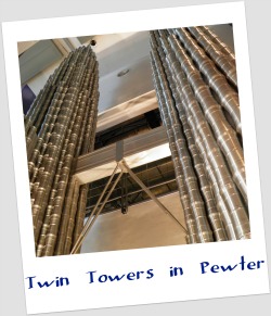 Model of Petronas Twin Towers made of 7000 Royal Selangor pewter tankards.