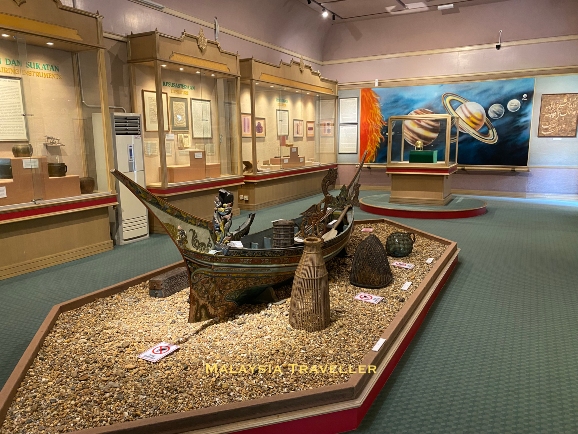 highly decorated Malay fishing boat in a museum gallery highly decorated Malay fishing boat in a museum gallery