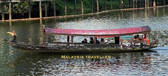 long boat with hornbill bow long boat with hornbill bow