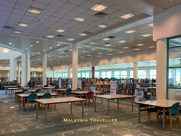 study area and bookshelves inside the main library