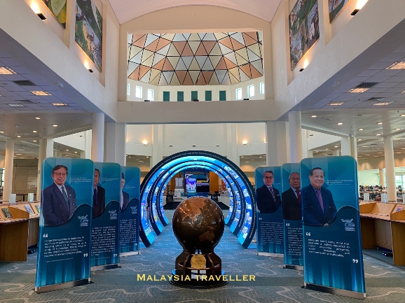 illuminated blue information boards inside the library