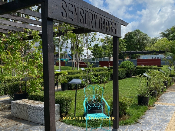 wooden pergola and planting in the sensory garden