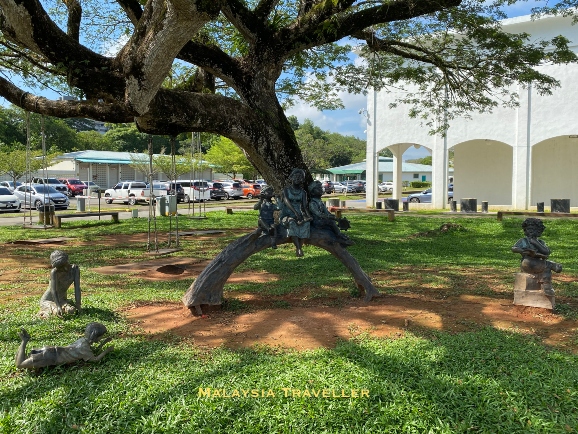 bronze statues of children