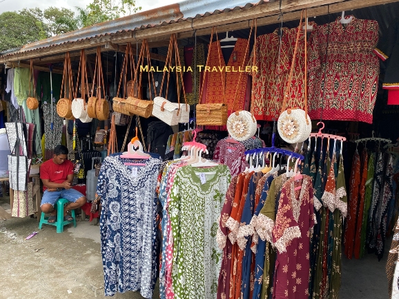 stall selling colourful clothing and bags