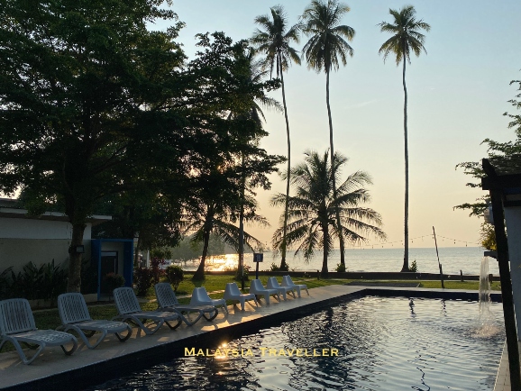 Rafflesia Resort pool at sunrise