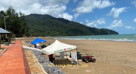 rental quad bikes lined up on the beach