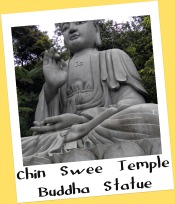 Stone Buddha statue at Chin Swee Temple