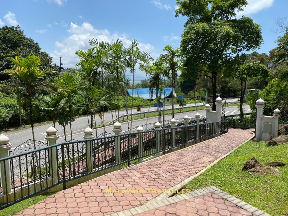 view from the mausoleum overlooking a road and the sea