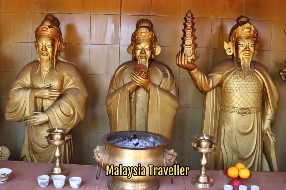 gold colour confucian deity statues