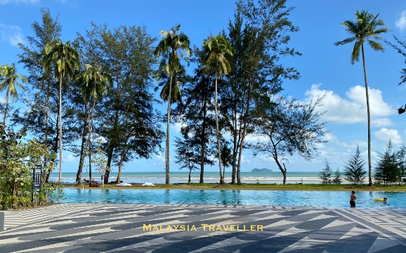 view of swimming pool with islands beyond