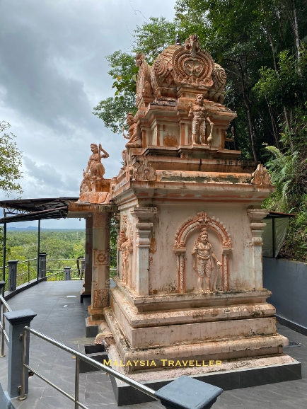 stone shrine decorated with HIndu statues