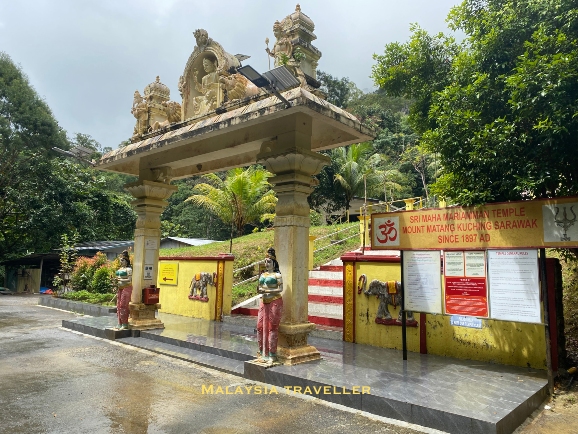 typical hindu templegateway flanked by a pair of female guardian statues.